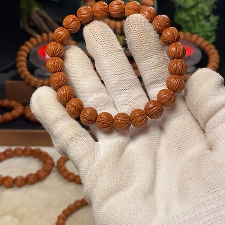 桃核吊坠正**力秦岭龙纹