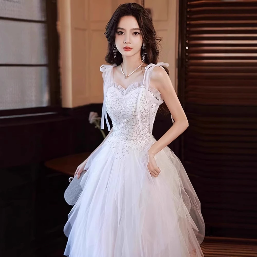 白色晚礼服裙女2025新款气质吊带订婚主持人生日小众成人礼高级感