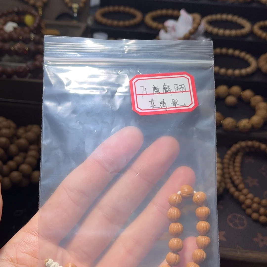莫****猴头核桃吊坠7+麒麟凤羽