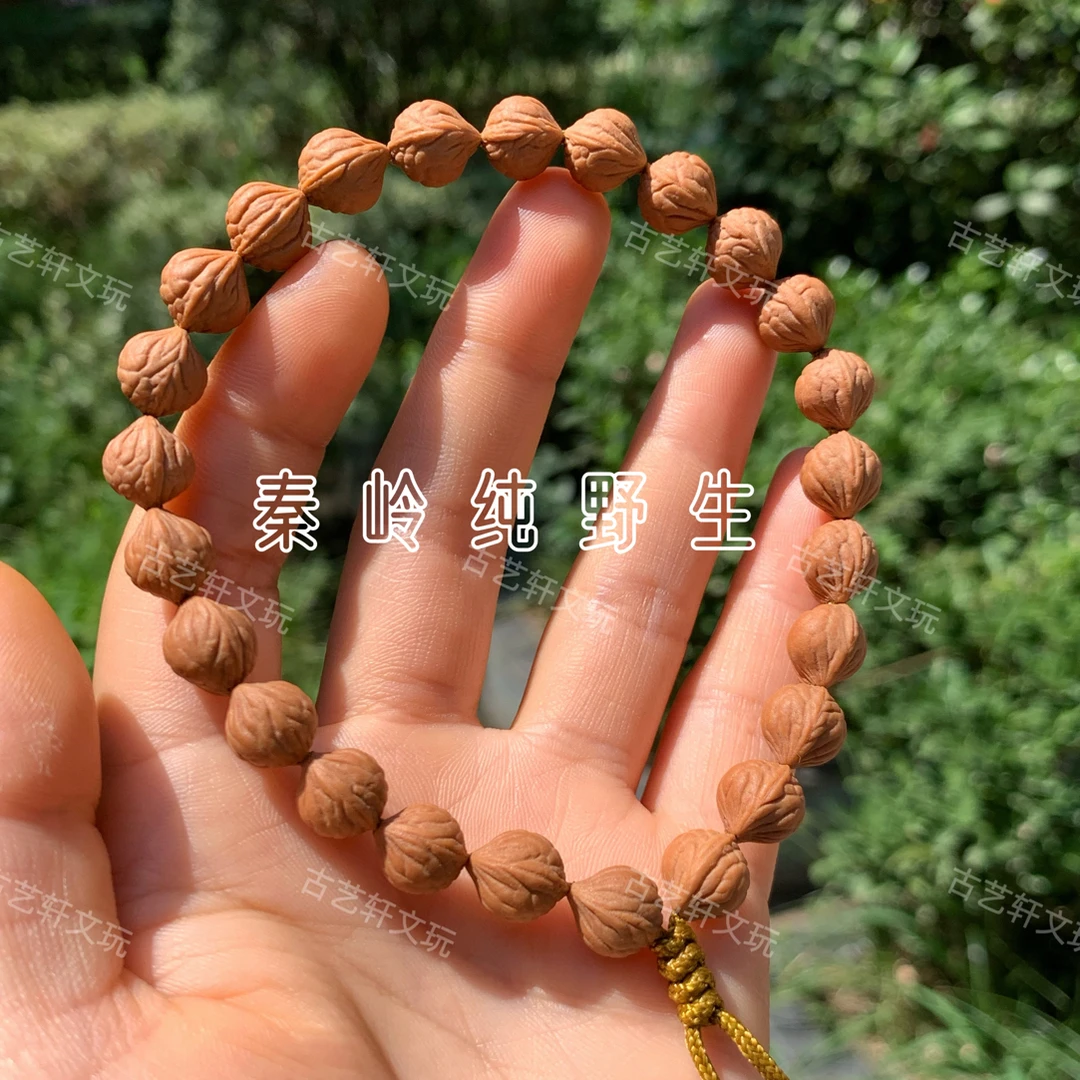 2025新品9-11mm秦岭纯野生奶油皮龙纹桃核全品无小奶豆桃核手串