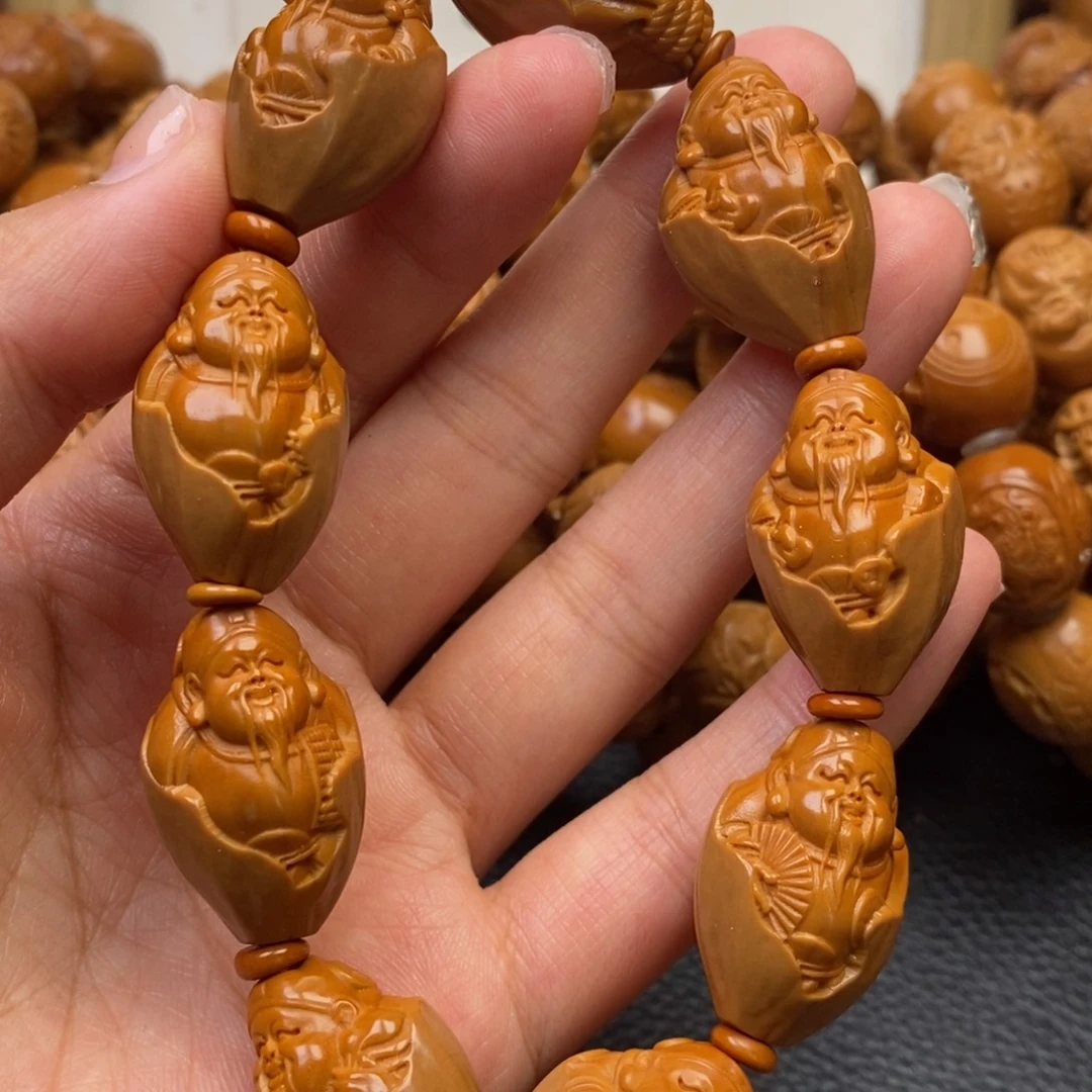 橄榄核吊坠包衣财神1.7