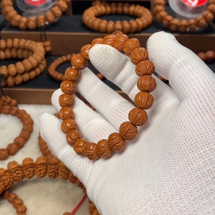 桃核吊坠拨**雾秦岭龙纹桃核