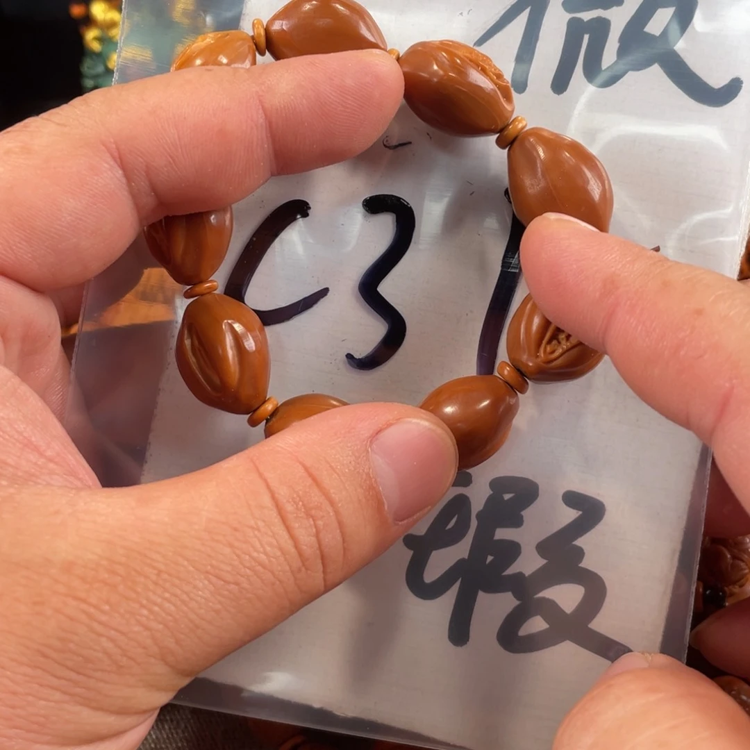 橄榄核其他橄榄核雕工艺手串 瑕疵介意勿拍