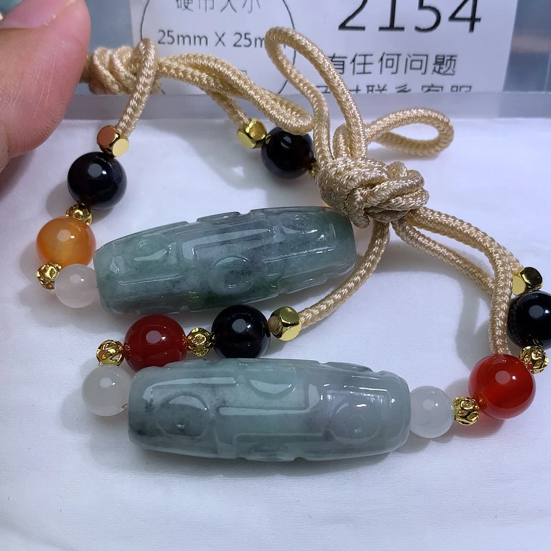 非***属翡翠未镶嵌颈饰2154。