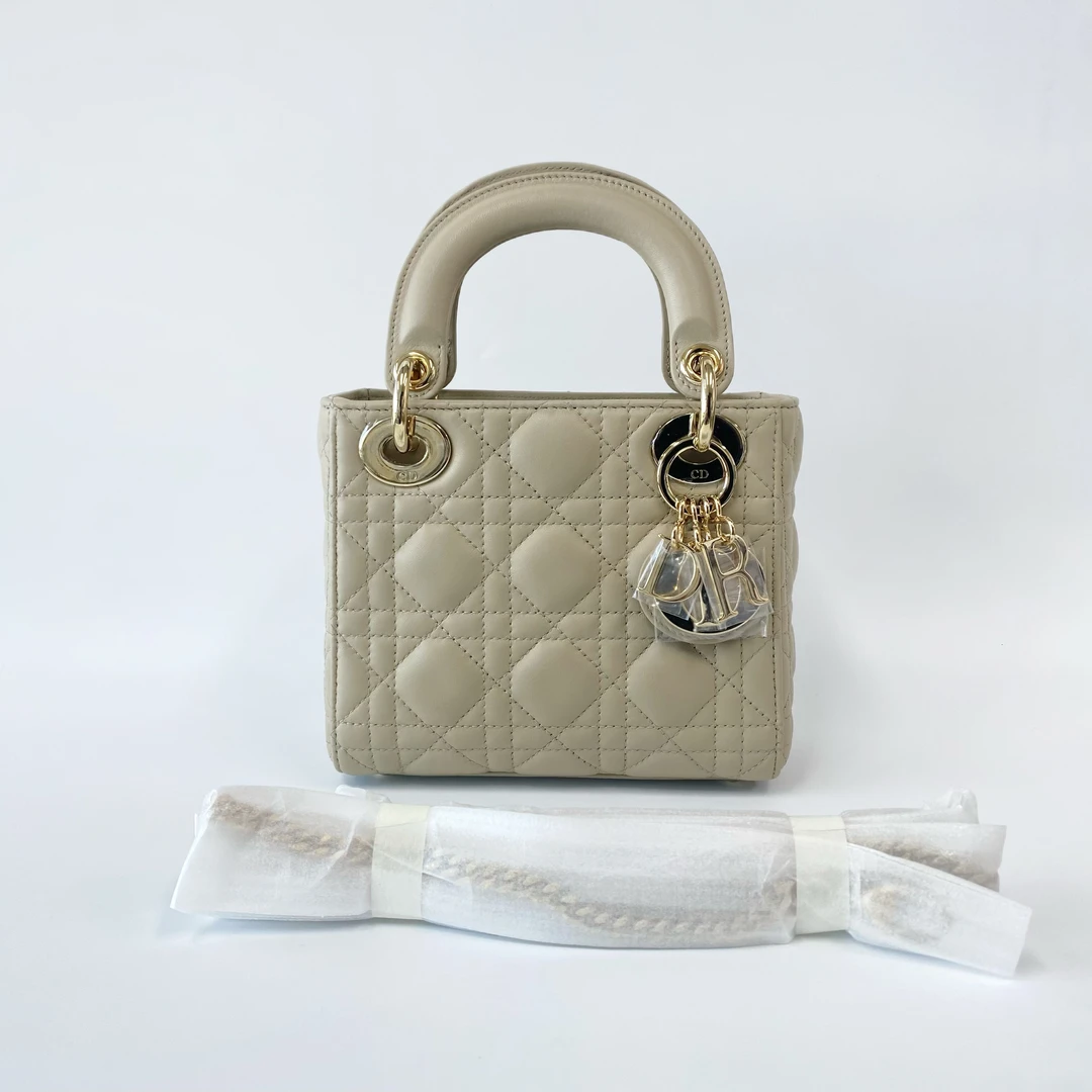 99新 DIOR/迪奥 99新 胭脂米色金扣三格戴妃手提斜挎包