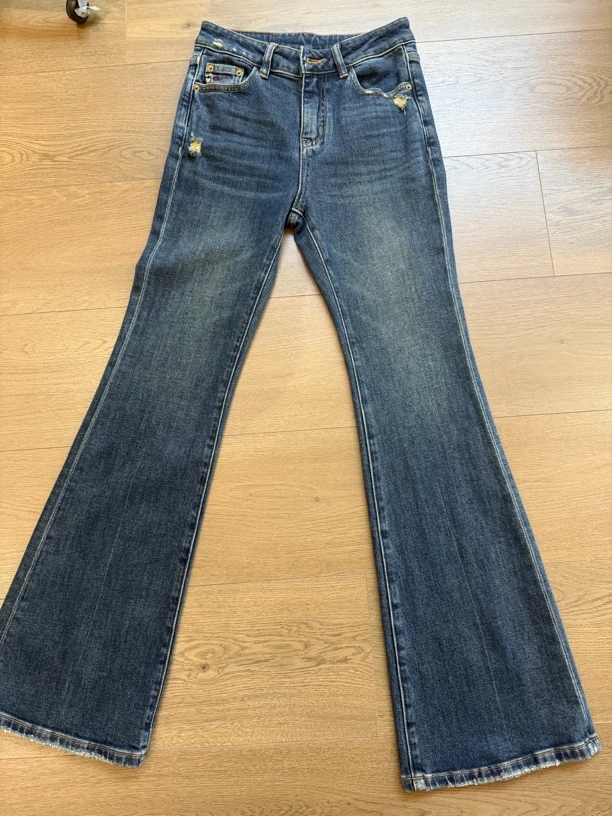 迷巧时尚春款牛仔喇叭裤