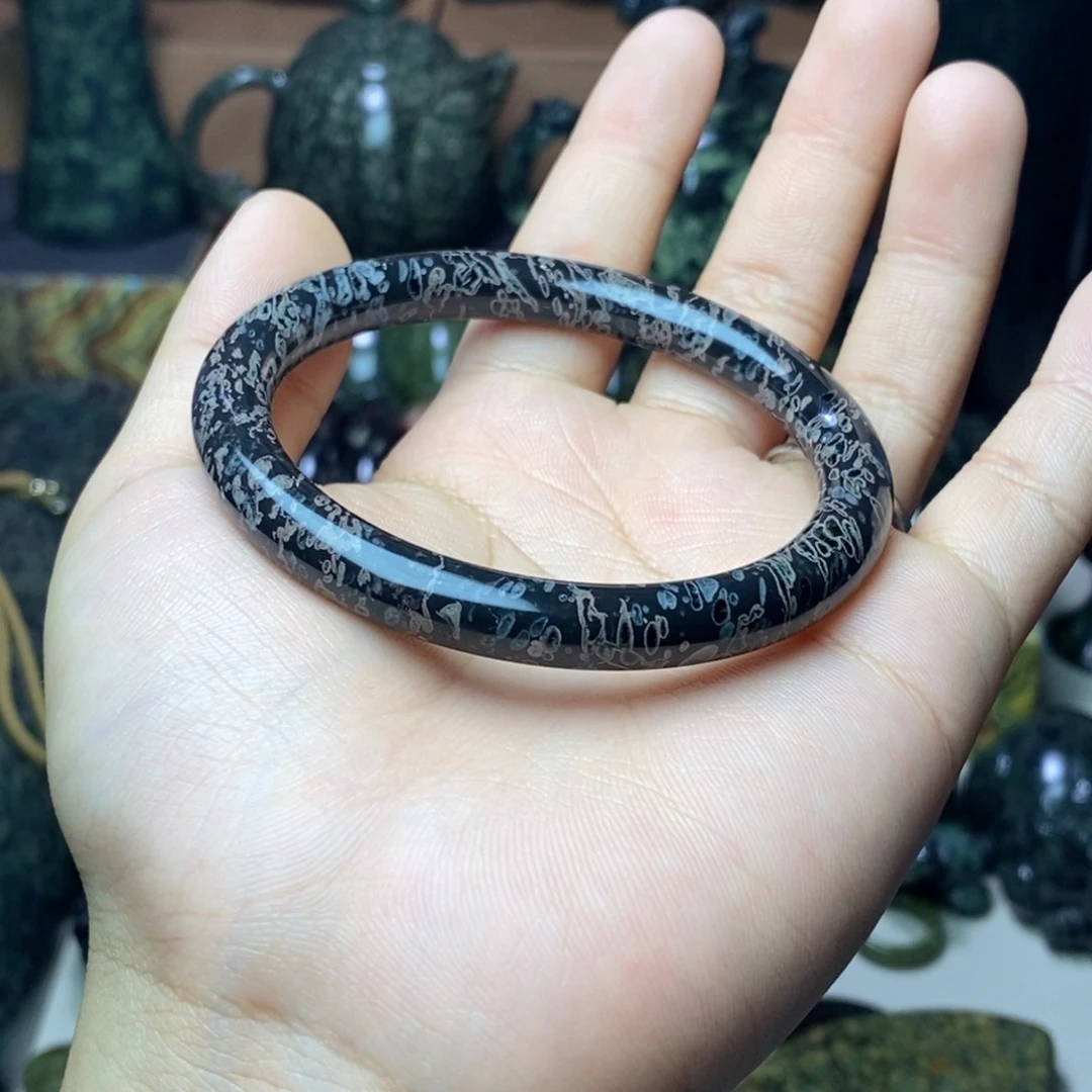 阿***紫未镶嵌蛇纹石玉吊坠