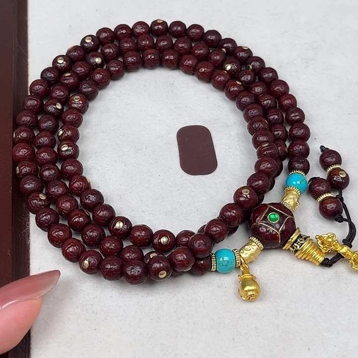 鞍***）凤眼菩提吊坠凤眼