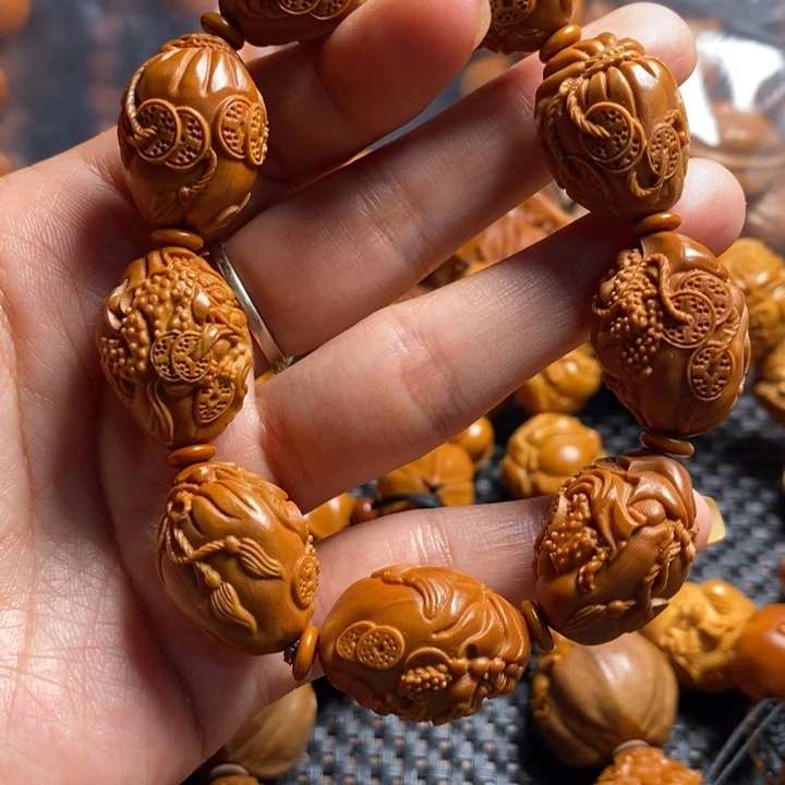 橄榄核吊坠金蟾手串