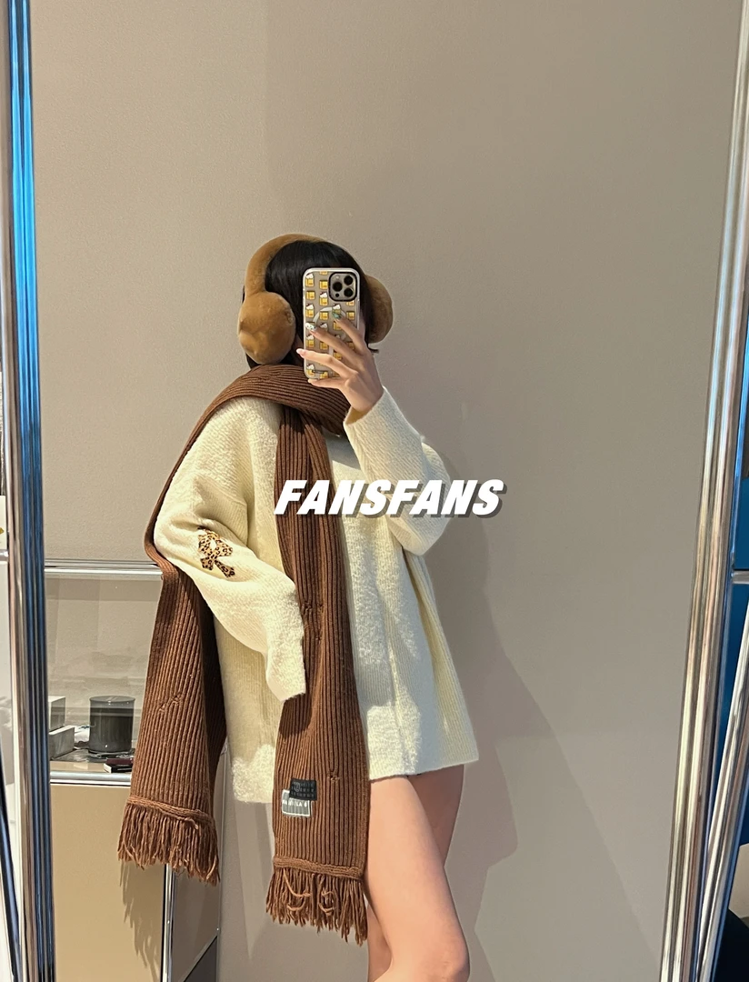 饱饱】白色软糯豹纹十字皮毛衣