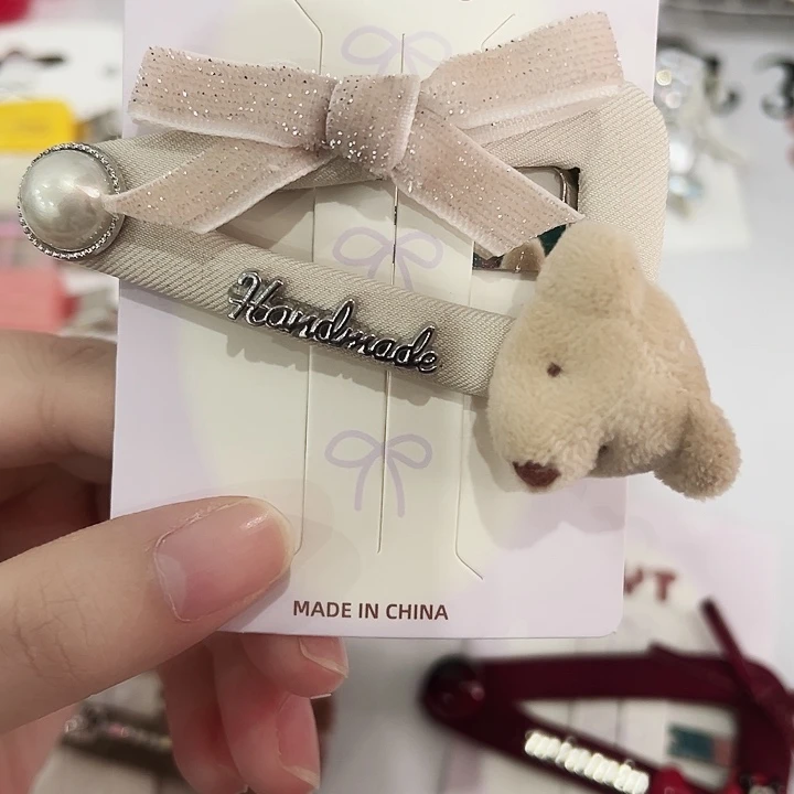 非金属皮质咖色蝴蝶结小熊