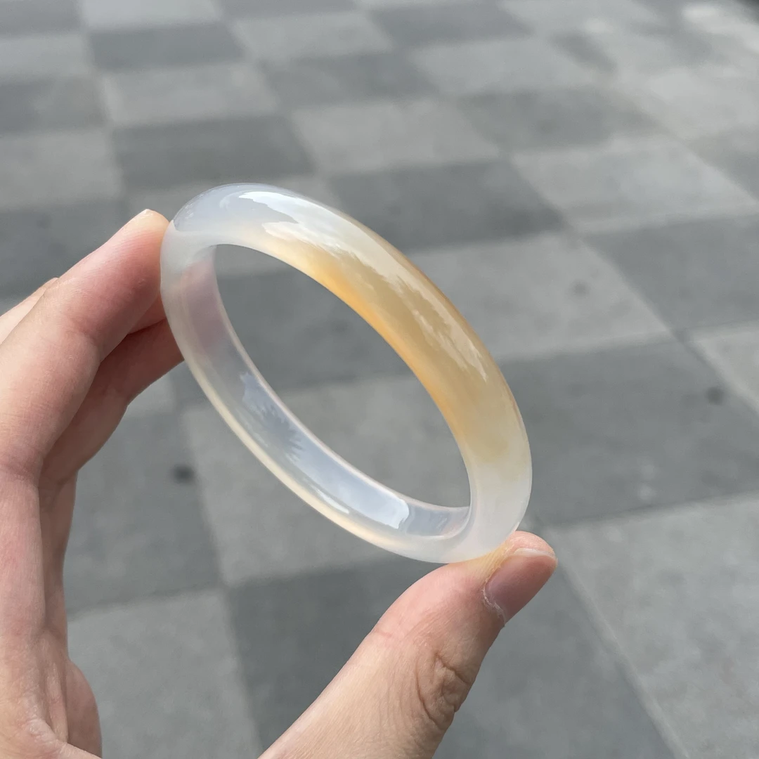 圈口57正圈白底橘色一口糖飘纹-玛瑙