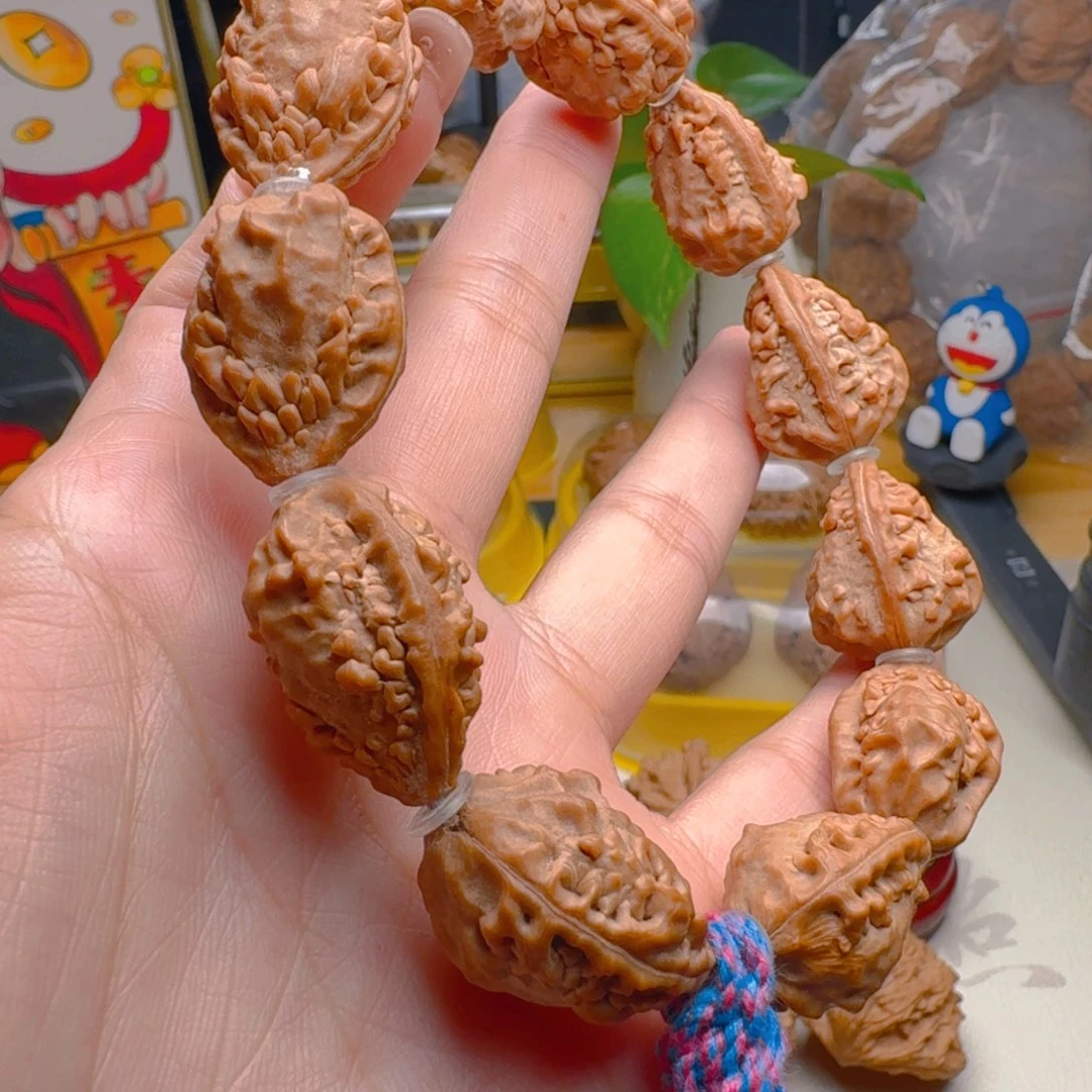 核桃把件麒麟角串