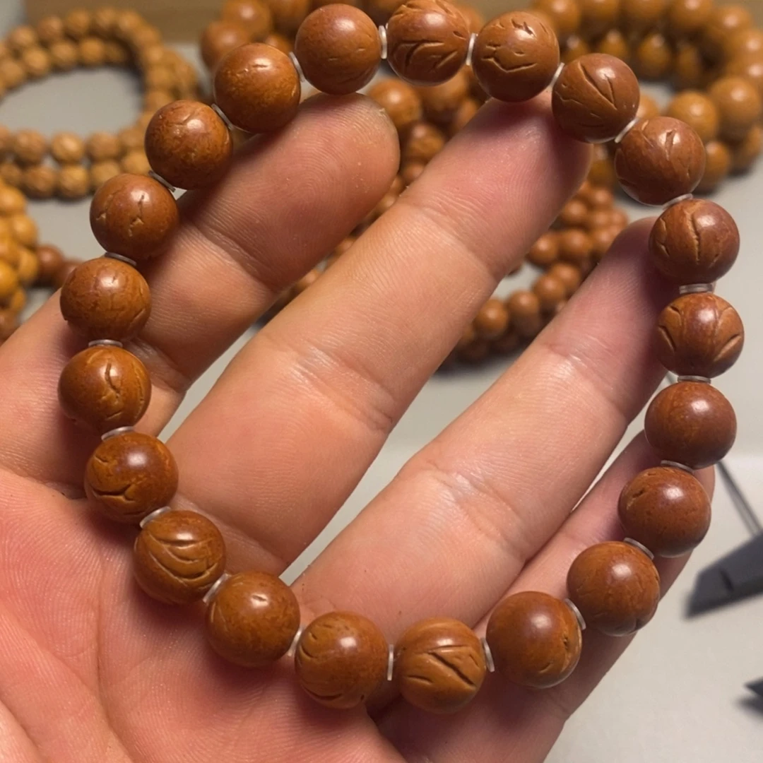 手串桃核龙纹光珠11
