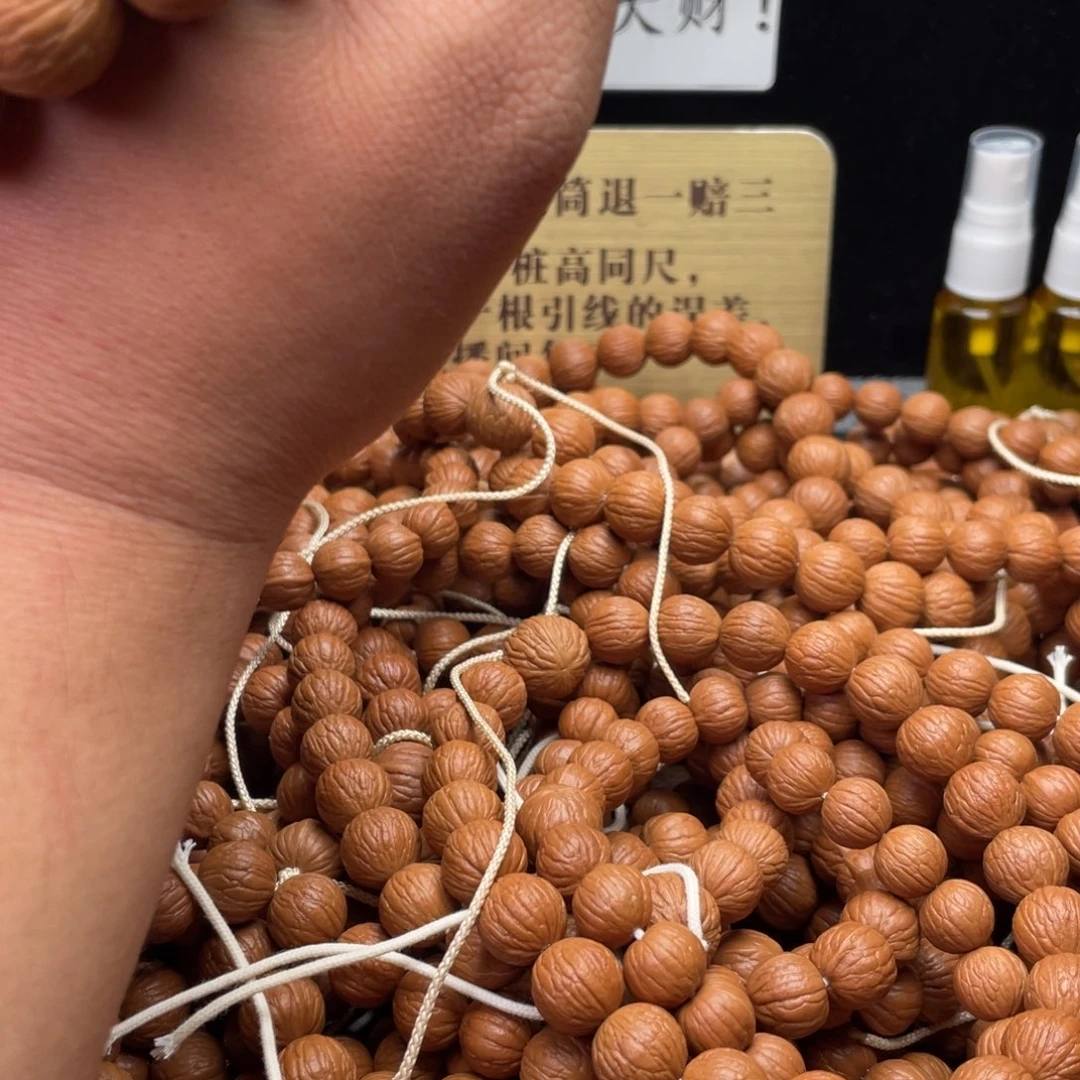 吊坠猴头核桃凤羽