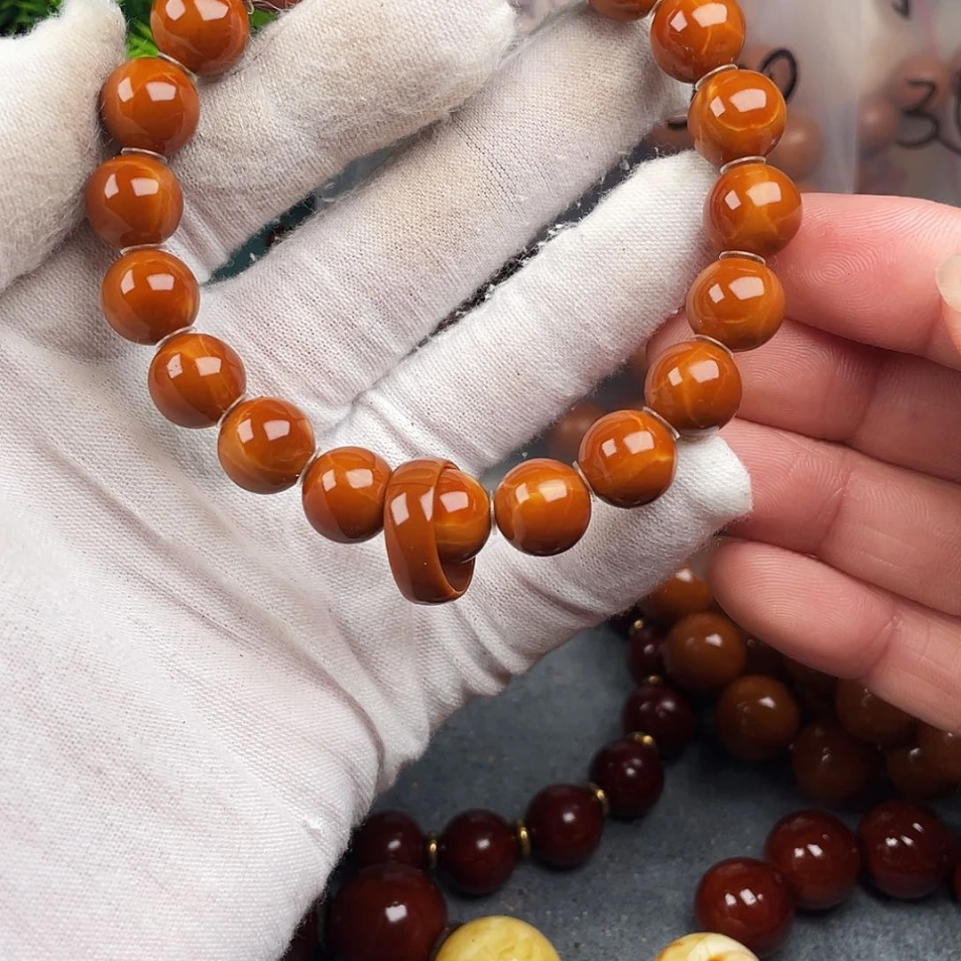 橄榄核手串羊**。1.1小红核精品