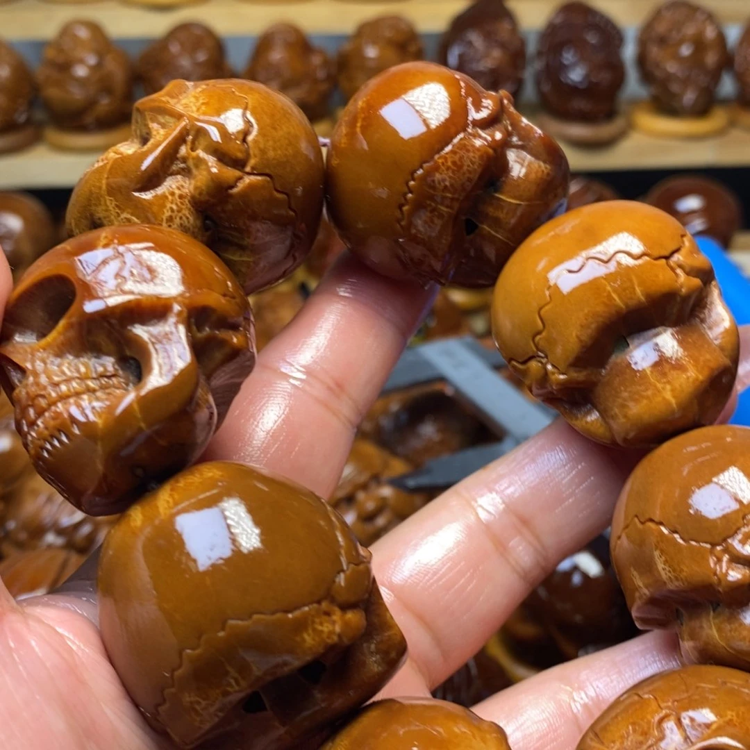 【闪购商品】橄榄核吊坠超****赁手持骷髅