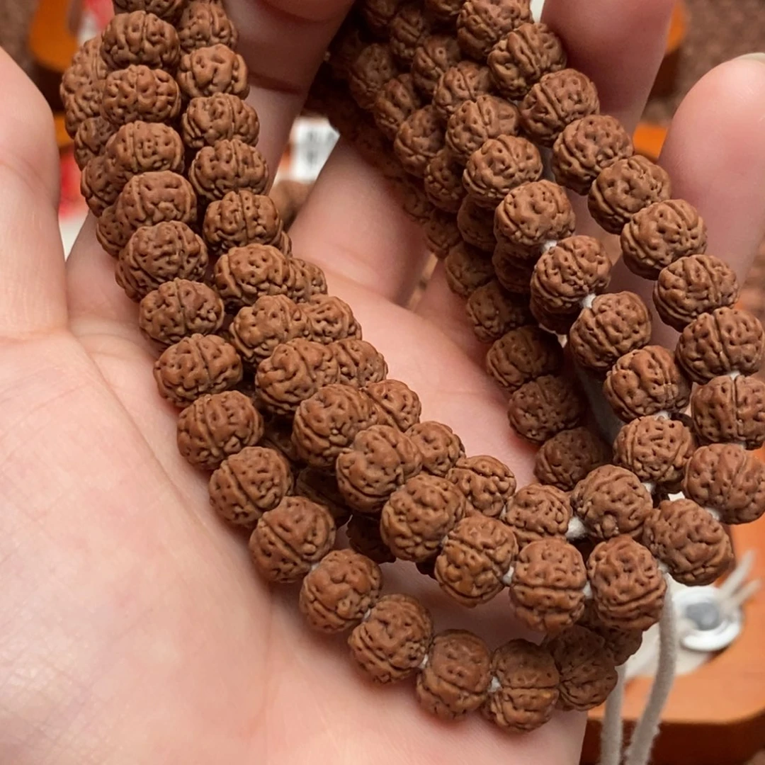 乐***哥吊坠金刚菩提老树王108