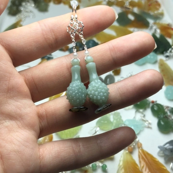 蛇纹石玉耳饰合金美****?