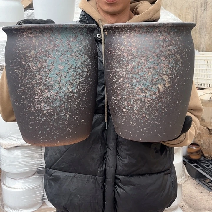 红陶泼墨两个口径20 高度25.5