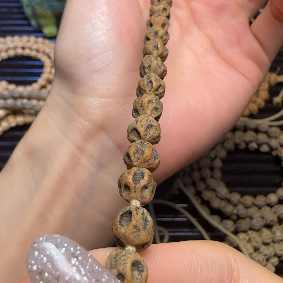 坦***然柏香籽/百香籽吊坠