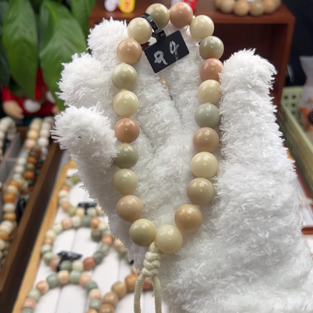 菩提根/象牙果手串小***姨卡14圆珠手持粉白蓝全品4
