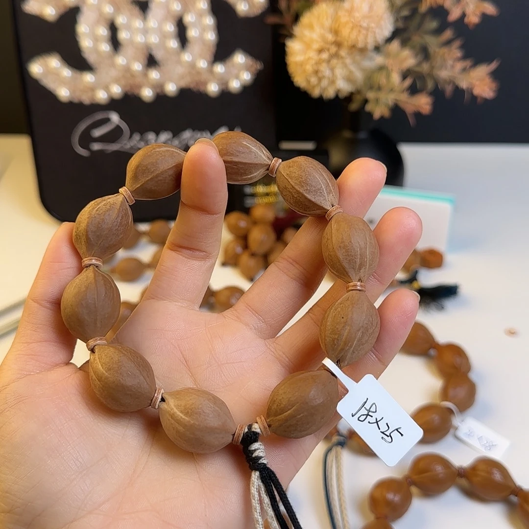 一***逗手串橄榄核梅林铁核18×25