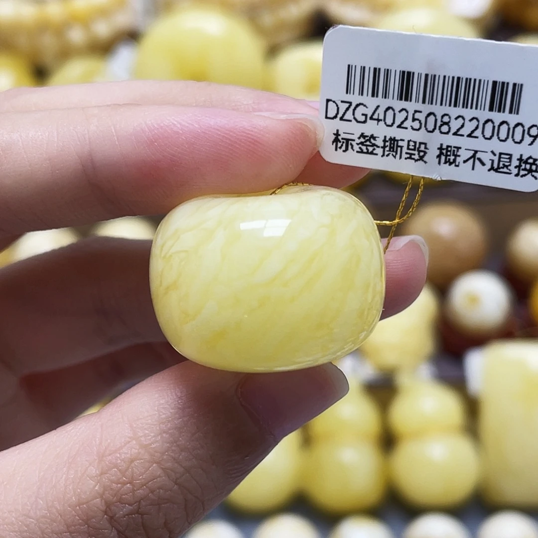 琥珀未镶嵌裸石25.1*17.9mm虎皮扣子瑕
