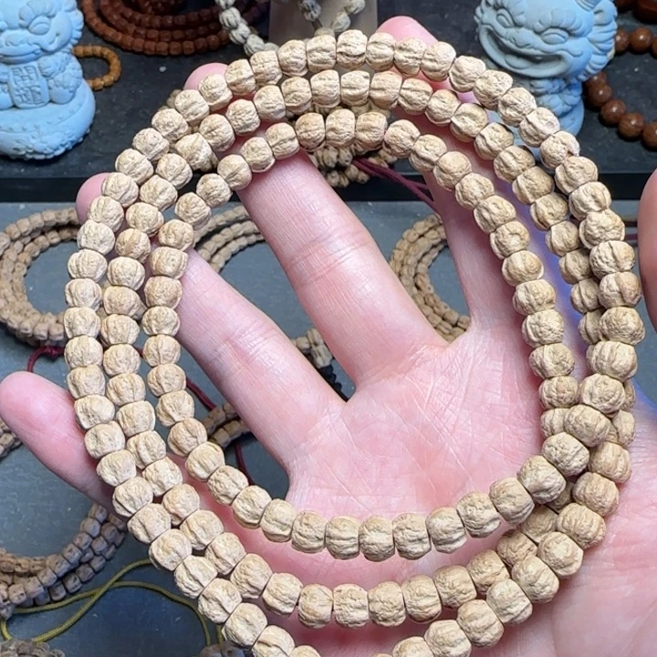 柏香籽/百香籽手串麻皮莲花桩