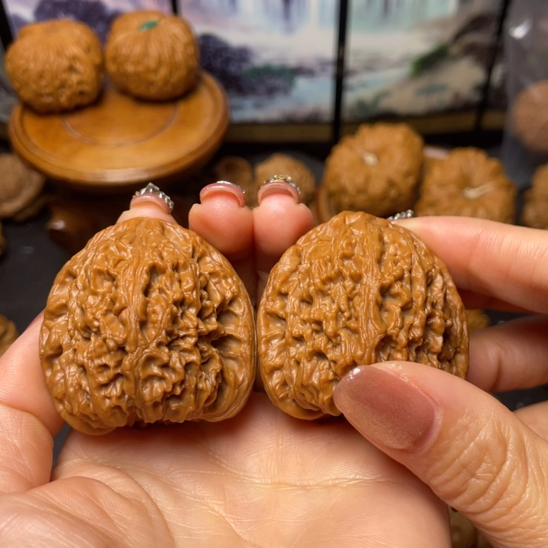 慎***言文玩核桃把件42南疆石
