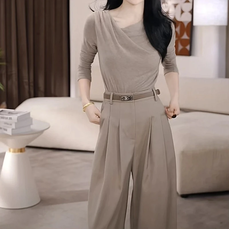 2025秋季新款法式别致不规则长袖T恤女显瘦内搭小众设计紧身上衣