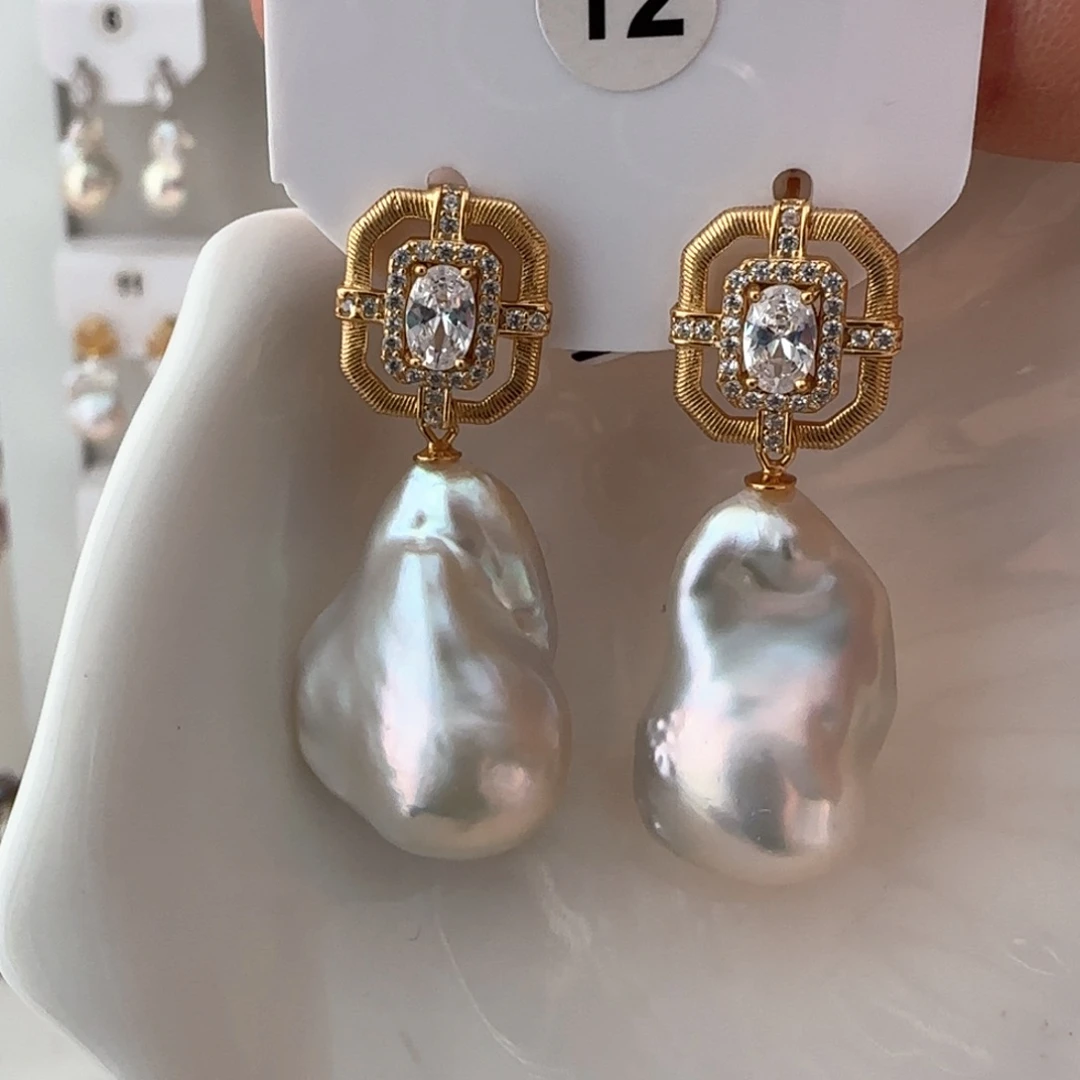 淡水珍珠耳饰银S925镶嵌D****?