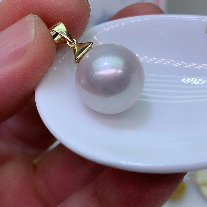 银S925镶嵌耳饰淡水珍珠冬***洋