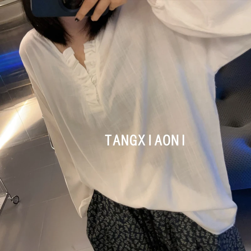 2店【白兰香】两色麻麻子小木耳边上衣