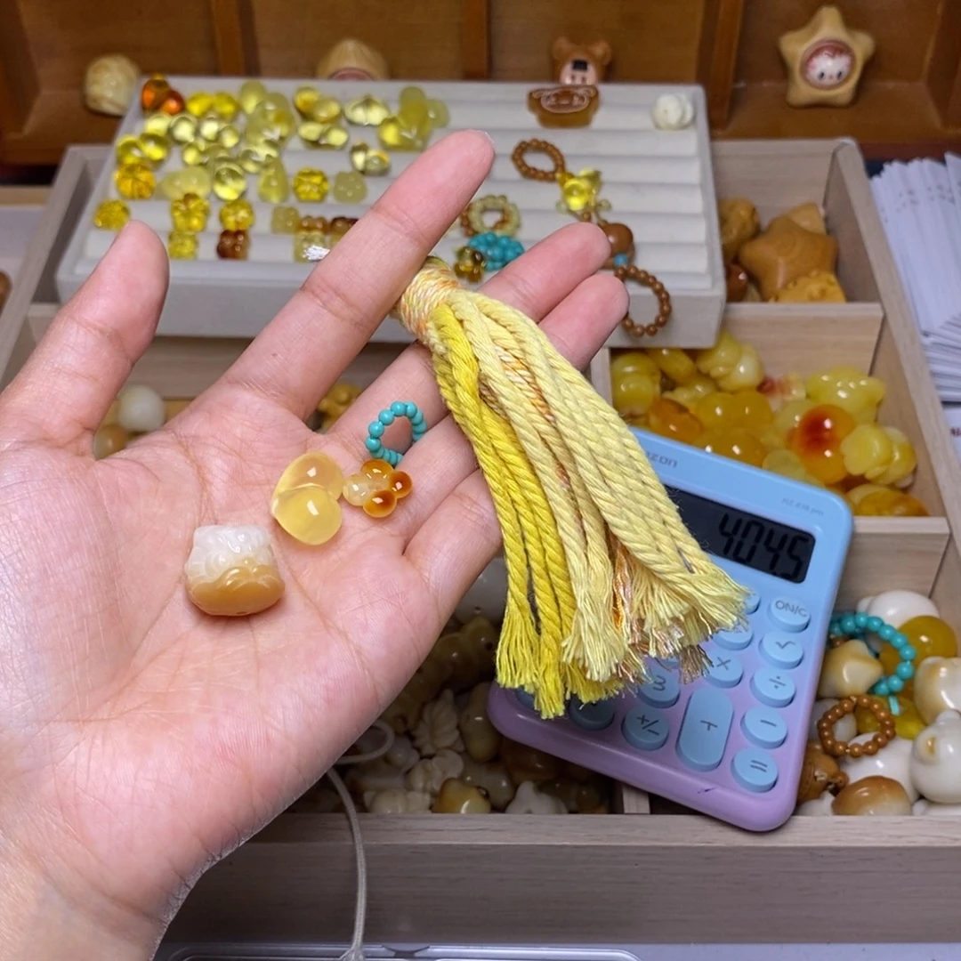 M***黄吊坠猴头核桃屁桃10蜜心1.56蜜花.041醒狮绿卡黄流苏