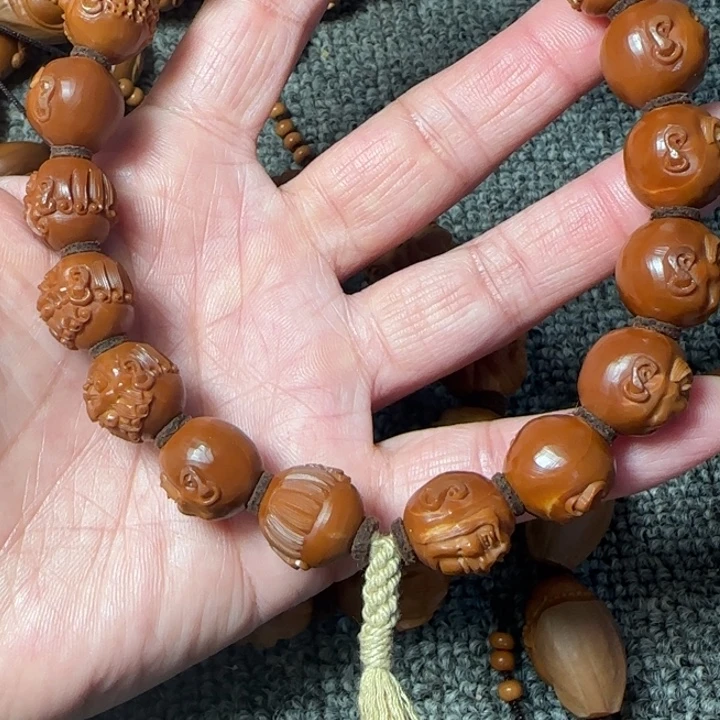 星***丶橄榄核吊坠十八罗汉手持