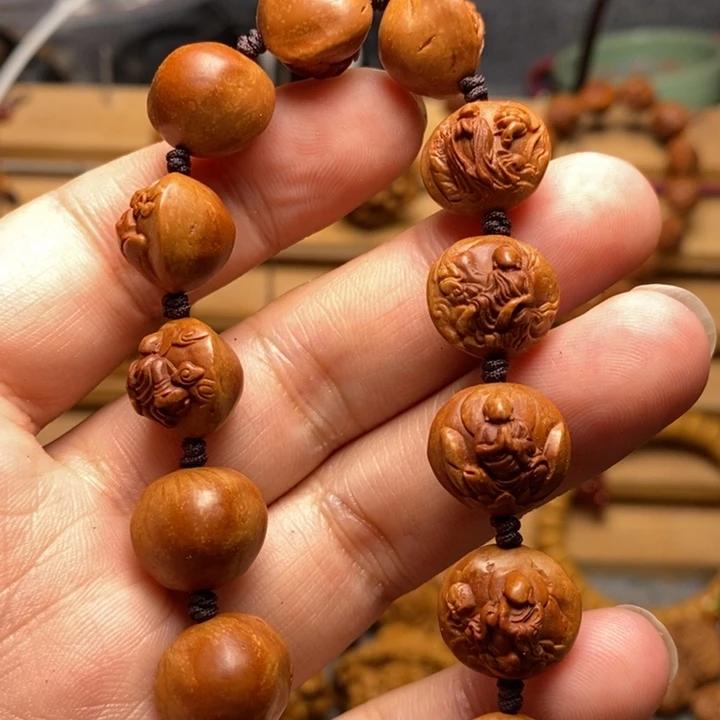 桃核雕刻无相佛手串