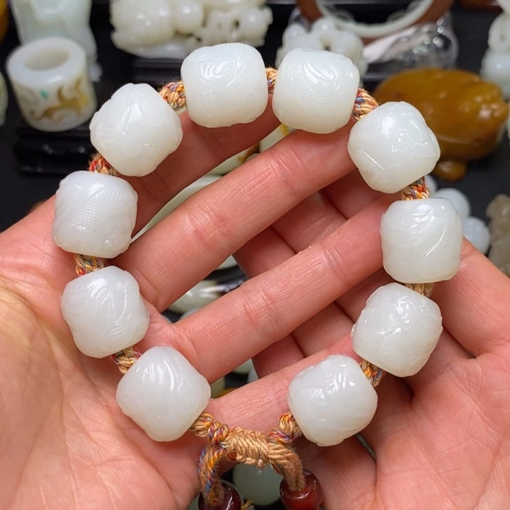 茗***毫和田玉未镶嵌把件