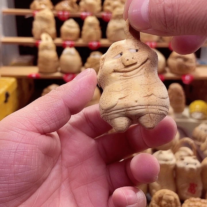 竹竹根雕小猪手把件