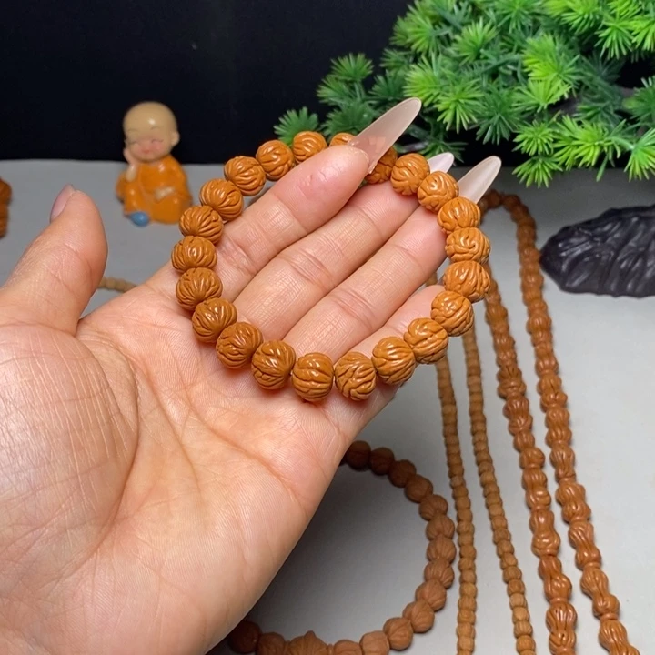 桃核手串凤羽手串