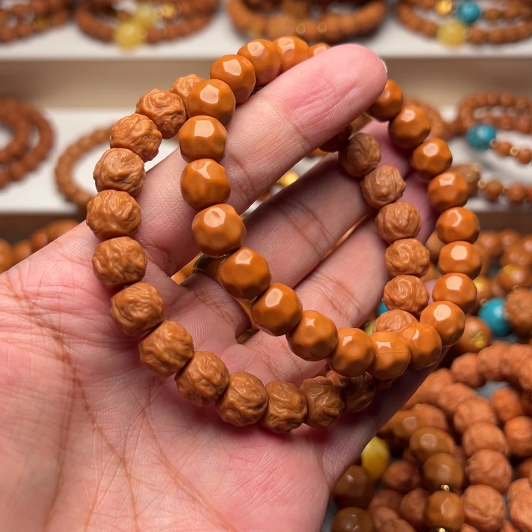 锡***司猴头核桃手串龙蛇奶酪