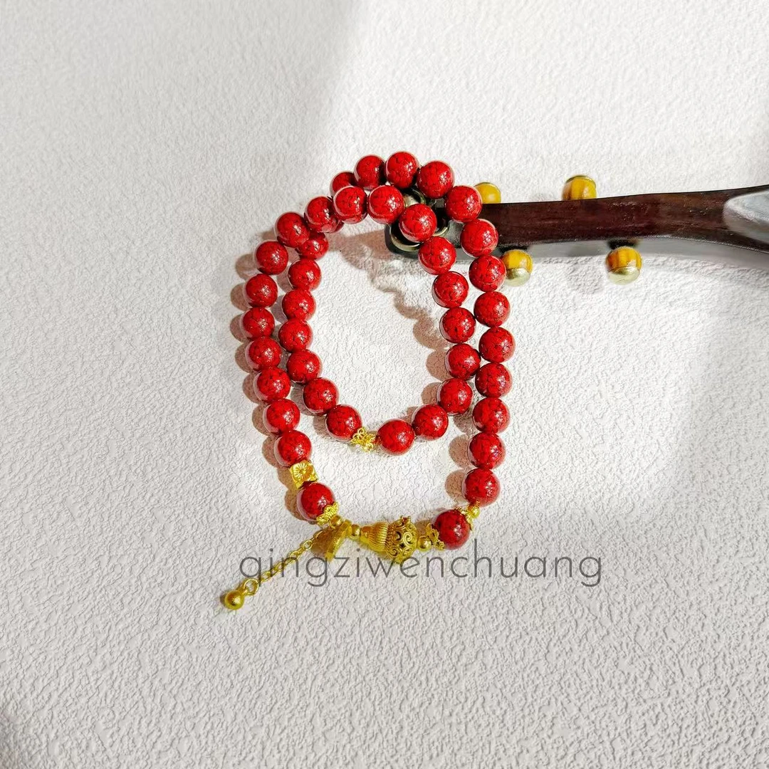 含辰砂工艺品DZ 1297-朱砂-8mm金色福牌双圈手串