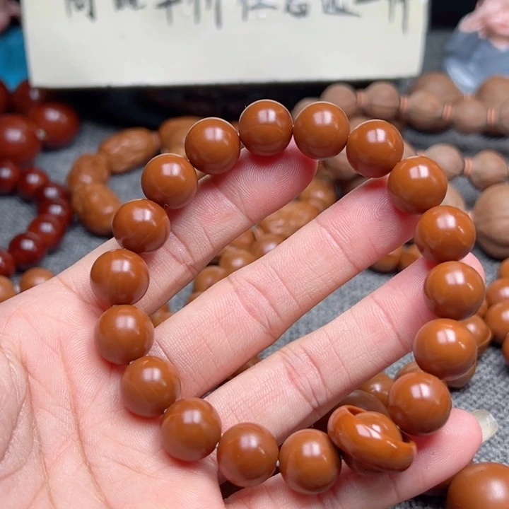 用***3橄榄核手串1.18精品超小孔