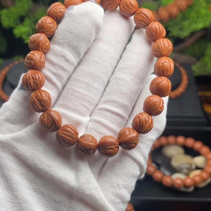 用***9桃核吊坠精品玉龙脊