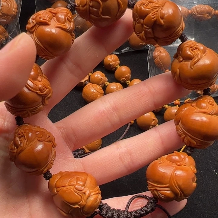 倾***～橄榄核手串大肚财神