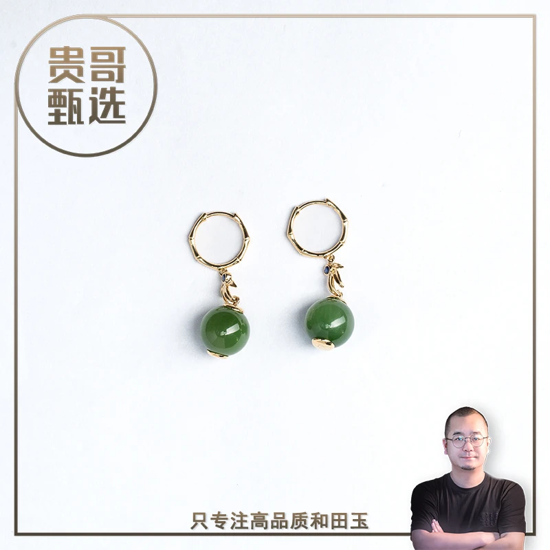 18k精工镶嵌10mm猫眼碧玉耳饰