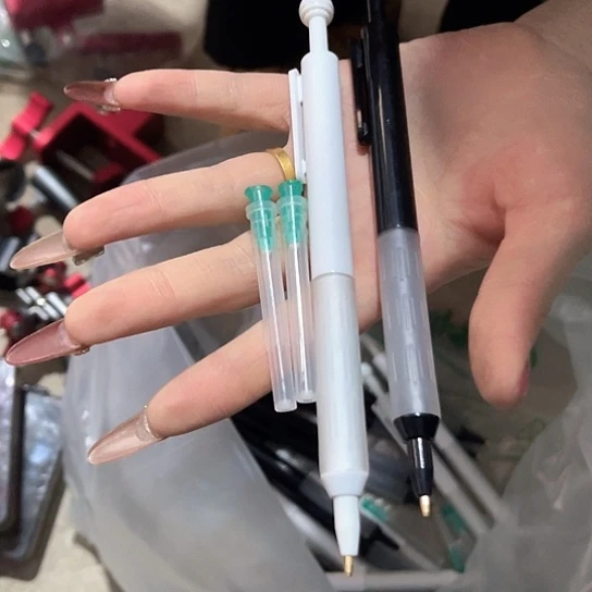 红虫笔拍一发两个带备用针头