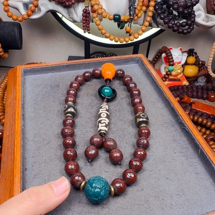 凤眼菩提吊坠手持