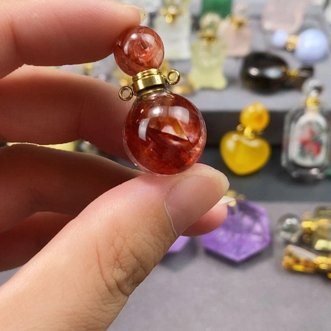 黄***女合金查罗石颈饰香水瓶