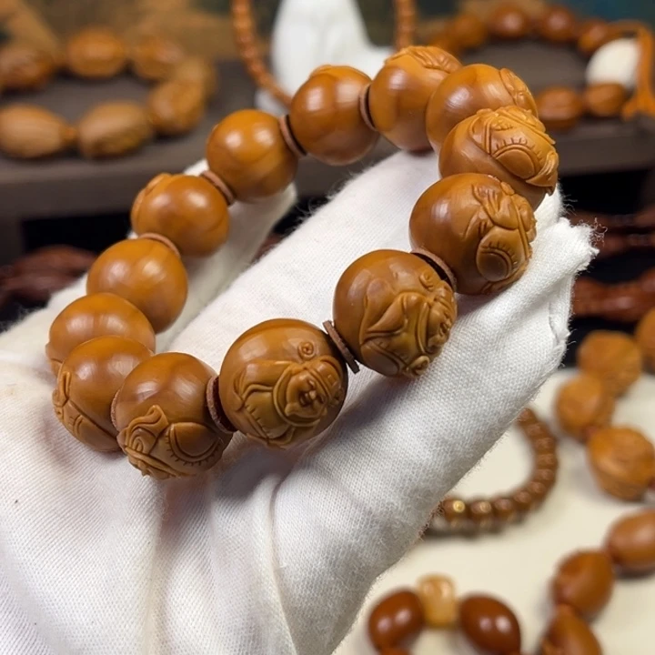 橄榄核手串浮雕海派cs